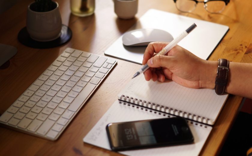 Closeup shot of an entrepreneur working from home and doing calculations