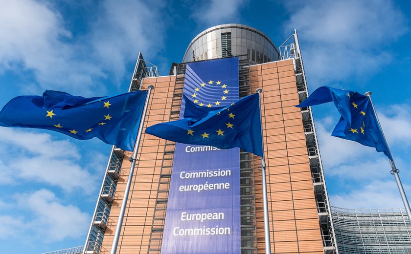 European Union flags waiving in front of Berlaymont building of the European Commission